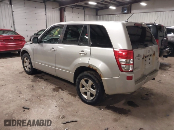 2012 Suzuki Grand Vitara Premium z VIN JS3TD0D62C4100440, wystawiony jako IAAI lot #41711815 z przebiegiem 171 527 mil mil oraz . Historia ofert i sprzedaży dostępna na DreamBid. Obrazek 3.