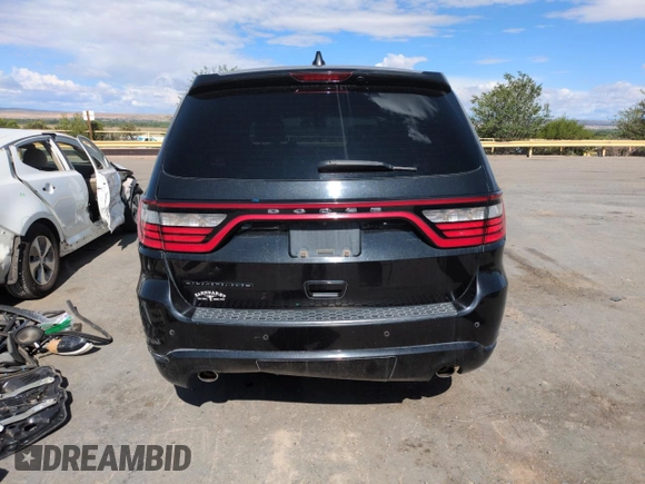 2015 Dodge Durango SXT with VIN 1C4RDHAG6FC850065, listed as a Copart auction lot 57144295 with 243,646 mi miles and Salvage title. Bid and sale history available at DreamBid. Image 6.