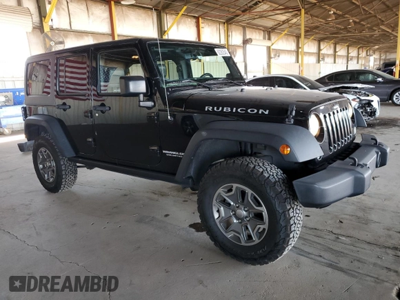 2015 Jeep Wrangler Unlimited Rubicon Hard Rock with VIN 1C4HJWFG1FL532288, listed as a Copart auction lot 62262545 with 91,807 mi miles and Salvage title. Bid and sale history available at DreamBid. Image 4.