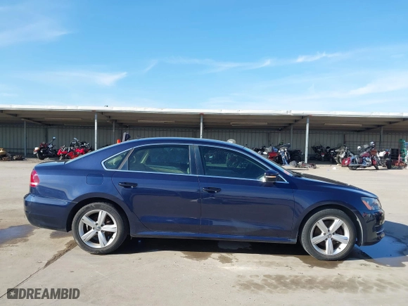 2012 Volkswagen Passat SE w/Sunroof with VIN 1VWBH7A35CC077207, listed as a IAAI auction lot 41351317 with 136,904 mi miles. Bid and sale history available at carsss.com. Image 13.