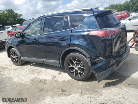 2018 Toyota RAV4 SE with VIN JTMJFREVXJD256779, listed as a Copart auction lot 52521195 with 100,453 mi miles and Salvage Title. Bid and sale history available at carsss.com. Image 2.