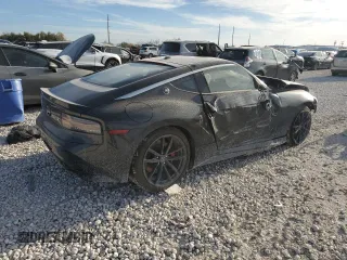 2024 Nissan Z Performance с VIN JN1BZ4BH3RM366584, выставлен на аукционе Copart как лот 49207535 с пробегом 4 936 миль миль и Списание • Salvage title. История ставок и продаж доступна на DreamBid. Изображение 3.