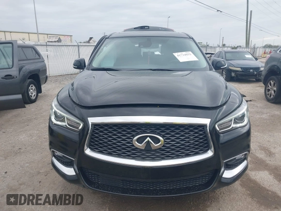 2020 Infiniti QX60 Pure with VIN 5N1DL0MN0LC527050, listed as a IAAI auction lot 41734032 with 71,204 mi miles and . Bid and sale history available at DreamBid. Image 12.