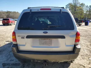 2003 Ford Escape XLT Popular with VIN 1FMYU03163KB45334, listed as a Copart auction lot 86947804 with 121,234 mi miles and Salvage Title. Bid and sale history available at carsss.com. Image 6.