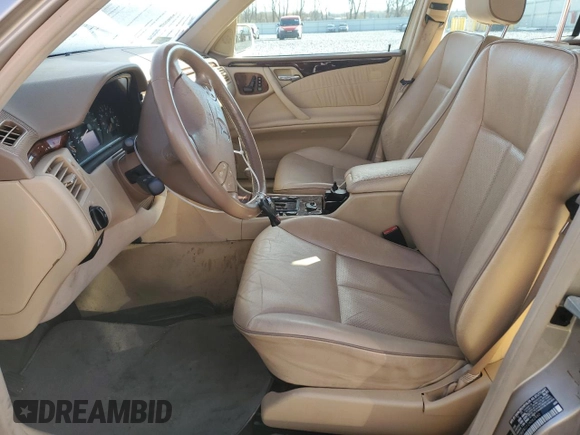 2002 Mercedes-Benz E-Class with VIN WDBJF82J12X062460, listed as a Copart auction lot 79264964 with 113,725 mi miles and Salvage Title. Bid and sale history available at carsss.com. Image 7.