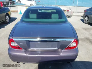 2008 Jaguar XJ with VIN SAJWA71B68SH22853, listed as a IAAI auction lot 41678688 with 76,367 mi miles. Bid and sale history available at carsss.com. Image 16.