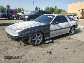 1987 Toyota Supra с VIN JT2MA70L5H0048275, выставлен на аукционе Copart как лот 56211275 с пробегом 67 084 миль миль и Списание • Salvage title. История ставок и продаж доступна на DreamBid. Изображение 1.