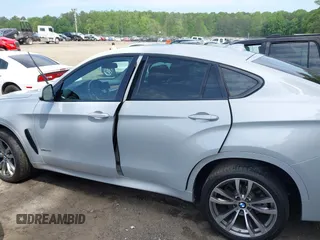 2016 BMW X6 xDrive50i z VIN 5UXKU6C57G0R33572, wystawiony jako IAAI lot #42103956 z przebiegiem 65 520 mil mil oraz . Historia ofert i sprzedaży dostępna na DreamBid. Obrazek 13.
