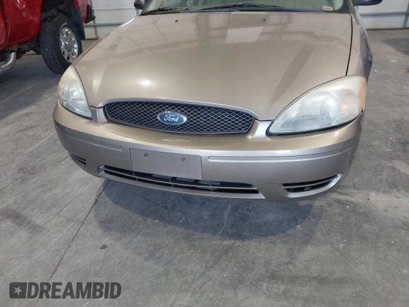 2006 Ford Taurus SE with VIN 1FAFP53U46A123827, listed as a IAAI auction lot 42042946 with 146,393 mi miles. Bid and sale history available at carsss.com. Image 6.