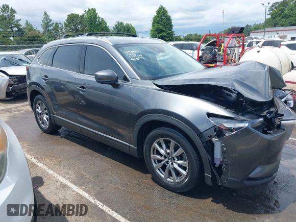 2019 Mazda CX-9 Touring with VIN JM3TCACY6K0334085, listed as a IAAI auction lot 42391595 with 113,723 mi miles and . Bid and sale history available at DreamBid. Image 13.