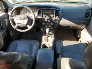 2006 Mazda Tribute S with VIN 4F2YZ06136KM31485, listed as a Copart auction lot 75412344 with Not Provided miles and Salvage Title. Bid and sale history available at DreamBid. Image 8.