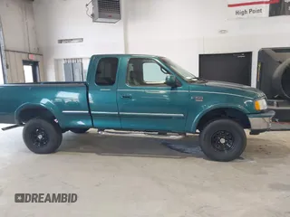 1998 Ford F-150 XL with VIN 1FTRX18L5WNB23716, listed as a IAAI auction lot 42579695 with 305,363 mi miles and . Bid and sale history available at DreamBid. Image 13.