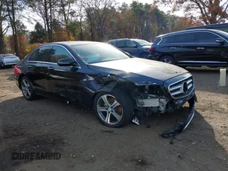 2017 Mercedes-Benz E-Class E 300 Luxury with VIN WDDZF4KB3HA108104, listed as a IAAI auction lot 40806522 with 56,053 mi miles. Bid and sale history available at carsss.com. Image 12.