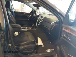 2014 Cadillac SRX Premium Collection z VIN 3GYFNGE38ES606731, wystawiony jako IAAI lot #41844450 z przebiegiem 156 541 mil mil oraz . Historia ofert i sprzedaży dostępna na DreamBid. Obrazek 5.