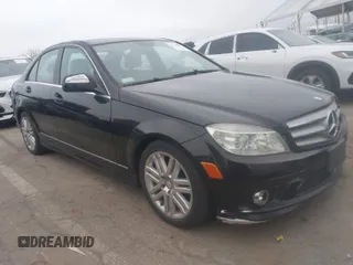2009 Mercedes-Benz C-Class 3.0L Sport with VIN WDDGF54X19F207143, listed as a IAAI auction lot 41718227 with 128,147 mi miles. Bid and sale history available at carsss.com. Image 1.
