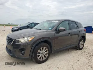 2016 Mazda CX-5 Touring z VIN JM3KE4CY4G0660014, wystawiony jako Copart lot #59597515 z przebiegiem 124 199 mil mil oraz Szkoda całkowita • Salvage title. Historia ofert i sprzedaży dostępna na DreamBid. Obrazek 1.