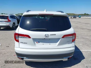 2022 Honda Pilot Touring 7-Passenger с VIN 5FNYF5H66NB034248, выставлен на аукционе IAAI как лот 41777362 с пробегом 26 611 миль миль и . История ставок и продаж доступна на DreamBid. Изображение 15.