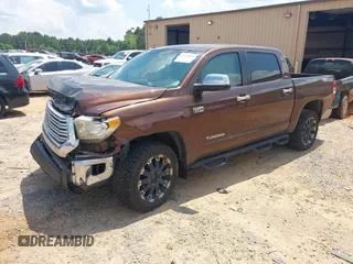 2014 Toyota Tundra Limited with VIN 5TFHW5F19EX400636, listed as a IAAI auction lot 42626818 with 267,402 mi miles and . Bid and sale history available at DreamBid. Image 19.