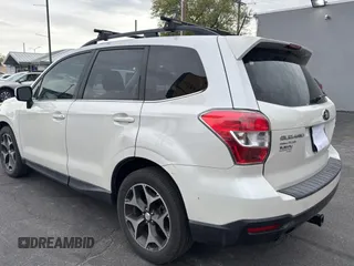 2014 Subaru Forester 2.0XT Premium with VIN JF2SJGDC1EH477436, listed as a Copart auction lot 54798465 with 124,807 mi miles and Clean Title. Bid and sale history available at carsss.com. Image 3.