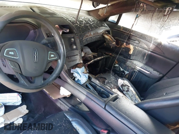 2015 Lincoln MKZ с VIN 3LN6L2JK3FR616535, выставлен на аукционе IAAI как лот 41898478 с пробегом Не указан миль и . История ставок и продаж доступна на DreamBid. Изображение 6.