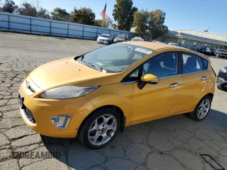 2011 Ford Fiesta SES with VIN 3FADP4FJ6BM124655, listed as a Copart auction lot 42670165 with 112,008 mi miles and Salvage Title. Bid and sale history available at carsss.com. Image 1.