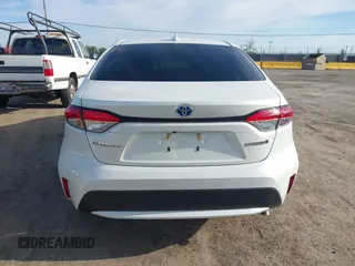 2020 Toyota Corolla Hybrid LE with VIN JTDEBRBE4LJ019579, listed as a IAAI auction lot 42024106 with 59,240 mi miles. Bid and sale history available at carsss.com. Image 17.