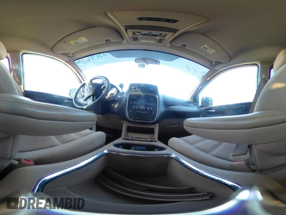 2016 Dodge Grand Caravan SXT with VIN 2C4RDGCGXGR257633, listed as a IAAI auction lot 41514684 with 108,743 mi miles and . Bid and sale history available at DreamBid. Image 18.