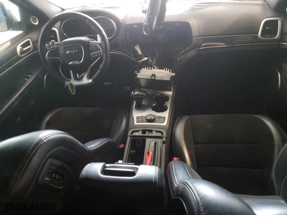 2015 Jeep Grand Cherokee SRT with VIN 1C4RJFDJ9FC237930, listed as a Copart auction lot 63540384 with 126,606 mi miles and Salvage Title. Bid and sale history available at carsss.com. Image 8.