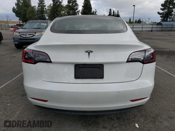 2021 Tesla Model 3 Standard Range Plus with VIN 5YJ3E1EA6MF066064, listed as a Copart auction lot 54063625 with 27,424 mi miles and Salvage Title. Bid and sale history available at DreamBid. Image 6.