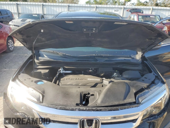 2019 Honda Pilot EX-L with VIN 5FNYF5H57KB025111, listed as a Copart auction lot 53779434 with 86,609 mi miles and Salvage title. Bid and sale history available at DreamBid. Image 14.