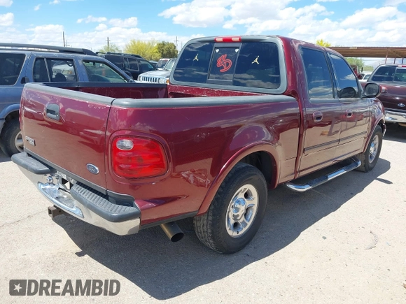 2003 Ford F-150 XLT with VIN 1FTRW07693KC11903, listed as a IAAI auction lot 41993455 with 301,023 mi miles. Bid and sale history available at carsss.com. Image 4.