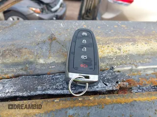 2019 Ford Escape Titanium z VIN 1FMCU9J99KUA72809, wystawiony jako IAAI lot #41588522 z przebiegiem Nie podano mil oraz . Historia ofert i sprzedaży dostępna na DreamBid. Obrazek 11.