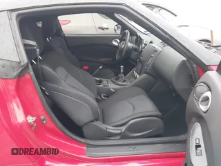2016 Nissan 370Z z VIN JN1AZ4EHXGM932681, wystawiony jako IAAI lot #42350850 z przebiegiem 94 586 mil mil oraz . Historia ofert i sprzedaży dostępna na DreamBid. Obrazek 5.