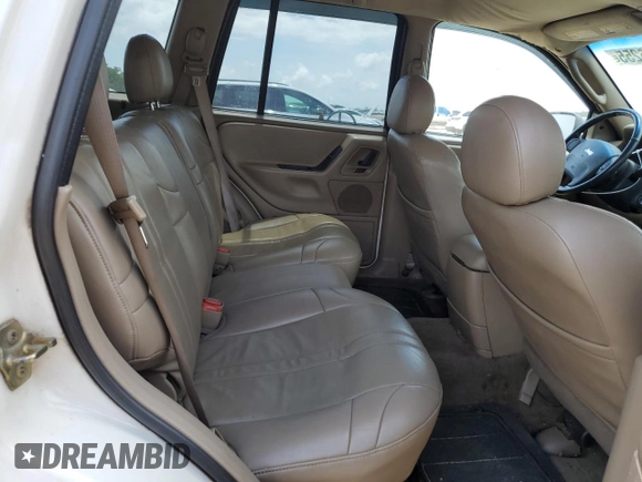 2002 Jeep Grand Cherokee Laredo z VIN 1J4GX48SX2C292081, wystawiony jako Copart lot #54246255 z przebiegiem 167 082 mil mil oraz Szkoda całkowita • Salvage title. Historia ofert i sprzedaży dostępna na DreamBid. Obrazek 11.