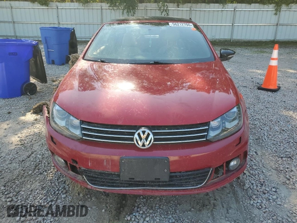 2014 Volkswagen Eos Sport z VIN WVWBW8AH9EV002933, wystawiony jako Copart lot #56212705 z przebiegiem 142 117 mil mil oraz Szkoda całkowita • Salvage title. Historia ofert i sprzedaży dostępna na DreamBid. Obrazek 5.