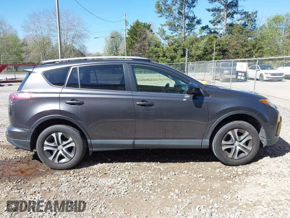 2016 Toyota RAV4 LE with VIN JTMZFREV5GJ078051, listed as a IAAI auction lot 41858381 with 97,032 mi miles and . Bid and sale history available at DreamBid. Image 13.