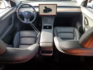 2023 Tesla Model Y Long Range with VIN 7SAYGAEE7PF619170, listed as a Copart auction lot 47647585 with 35,674 mi miles and Salvage Title. Bid and sale history available at DreamBid. Image 8.