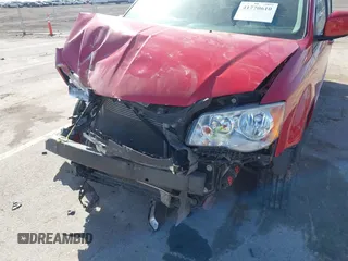 2014 Dodge Grand Caravan SXT with VIN 2C4RDGCG6ER477008, listed as a IAAI auction lot 41770610 with 89,843 mi miles and . Bid and sale history available at DreamBid. Image 6.