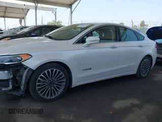 2017 Ford Fusion Hybrid Titanium with VIN 3FA6P0RU8HR229653, listed as a IAAI auction lot 42445182 with 163,279 mi miles and . Bid and sale history available at DreamBid. Image 14.