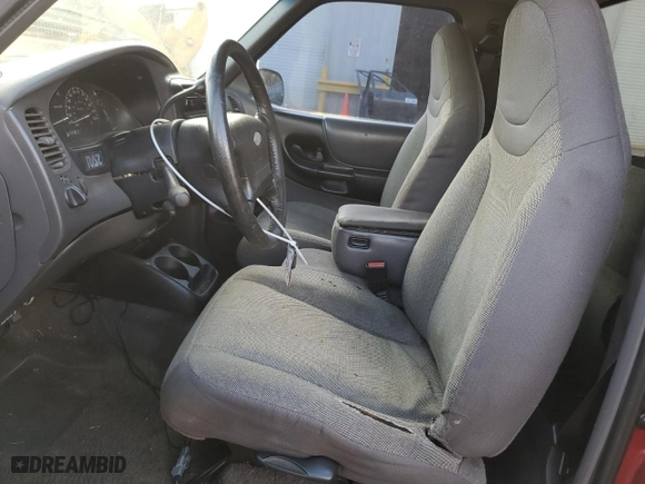 2001 Ford Ranger XL with VIN 1FTYR10DX1TA93403, listed as a Copart auction lot 79127184 with 214,269 mi miles and Salvage Title. Bid and sale history available at carsss.com. Image 7.