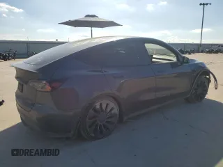 2022 Tesla Model Y Performance with VIN 7SAYGDEF8NF384270, listed as a Copart auction lot 56718215 with Not provided miles and Salvage title. Bid and sale history available at DreamBid. Image 3.