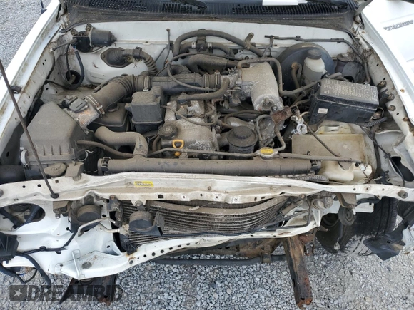 2002 Toyota Tacoma z VIN 5TENL42N22Z113383, wystawiony jako Copart lot #59007905 z przebiegiem 167 105 mil mil oraz Czysty tytuł • Clean title. Historia ofert i sprzedaży dostępna na DreamBid. Obrazek 11.