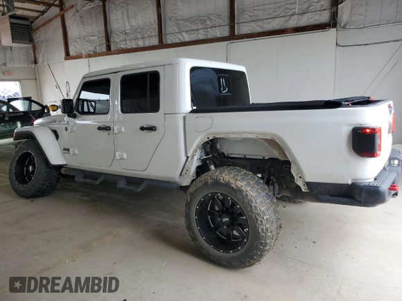 2020 Jeep Gladiator Rubicon z VIN 1C6JJTBG4LL102523, wystawiony jako Copart lot #54735955 z przebiegiem 104 579 mil mil oraz Szkoda całkowita • Salvage title. Historia ofert i sprzedaży dostępna na DreamBid. Obrazek 2.