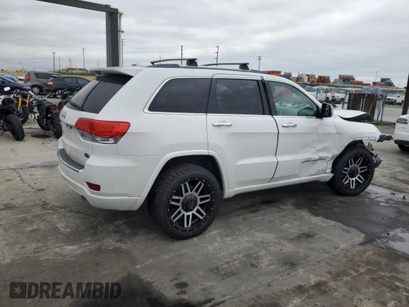 2015 Jeep Grand Cherokee Overland with VIN 1C4RJECG7FC872175, listed as a Copart auction lot 50653205 with 117,433 mi miles and Salvage title. Bid and sale history available at DreamBid. Image 3.