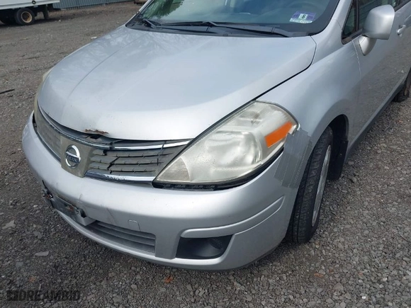 2009 Nissan Versa 1.8 S with VIN 3N1BC13E79L467366, listed as a IAAI auction lot 41800311 with 116,579 mi miles. Bid and sale history available at carsss.com. Image 6.