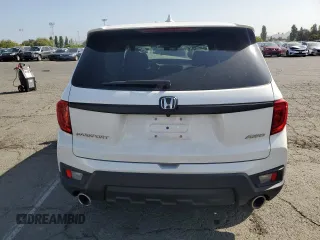 2023 Honda Passport EX-L with VIN 5FNYF8H58PB014241, listed as a Copart auction lot 55176105 with 16,672 mi miles and Salvage title. Bid and sale history available at DreamBid. Image 6.