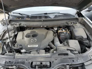 2017 Mazda CX-9 Signature с VIN JM3TCBEY3H0127651, выставлен на аукционе Copart как лот 62814425 с пробегом 171 263 миль миль и Списание • Salvage title. История ставок и продаж доступна на DreamBid. Изображение 12.