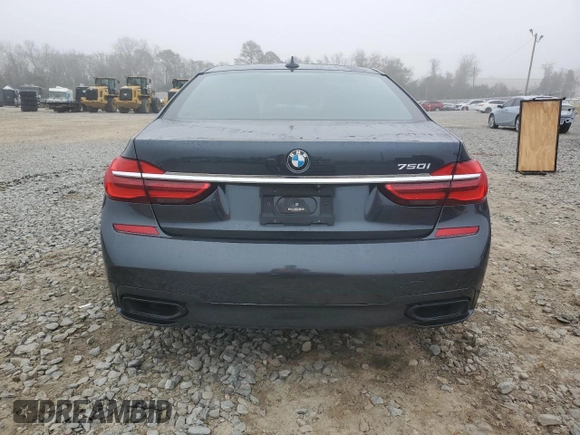2019 BMW 7 Series 750i with VIN WBA7F0C54KGM25281, listed as a Copart auction lot 84741334 with 76,472 mi miles and Salvage Title. Bid and sale history available at carsss.com. Image 6.