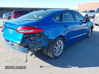 2020 Ford Fusion SE with VIN 3FA6P0H77LR153539, listed as a IAAI auction lot 42054318 with 103,820 mi miles and . Bid and sale history available at DreamBid. Image 4.