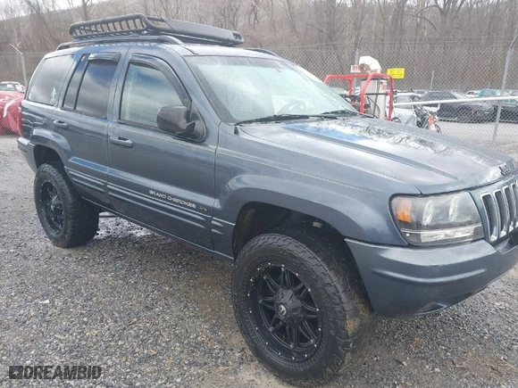 2003 Jeep Grand Cherokee Limited with VIN 1J4GW58N43C521617, listed as a IAAI auction lot 41781064 with 228,086 mi miles. Bid and sale history available at carsss.com. Image 1.
